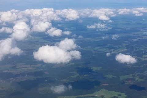 Cumulus clouds over the earth Stock Photos