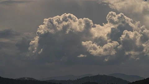 Cumulus Clouds Over Mountains Video stock 336705712