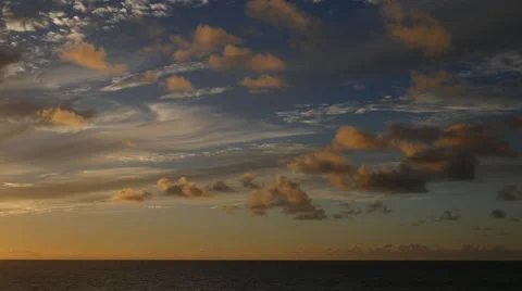 Cumulus clouds over ocean at sunrise, Kauai, Hawaii Stock Footage 41742306