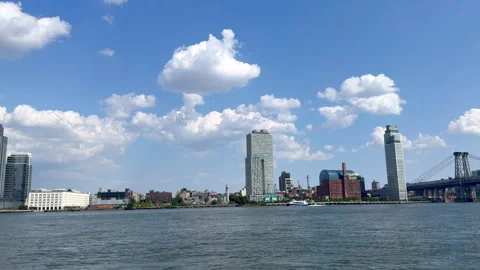 Cumulus Clouds over Williamsburg Skyline from East River Park in NYC Stock-Footage 343819450