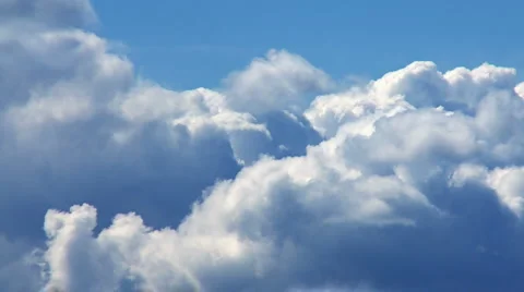 Cumulus clouds passing by on closeup Stock Footage 4880835
