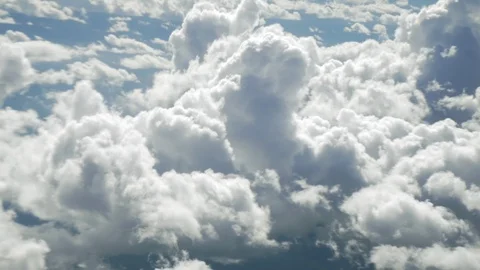 Cumulus Clouds from a Plane Stock Footage 87774716