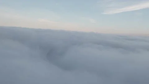 Cumulus clouds from a porthole close-up Vidéo 168907083