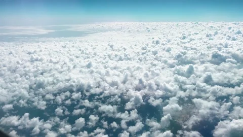 Cumulus Clouds Scattered Across Blue Sky with Bird's-eye View Seen Through .. Vídeos de archivo 239510192
