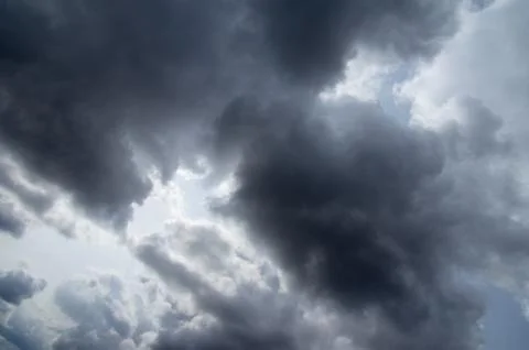 Cumulus clouds soaring high in the blue sky Stock Photos
