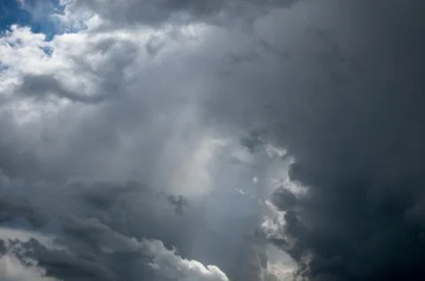 Cumulus clouds soaring high in the blue sky Foto stock
