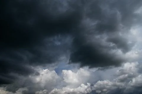 Cumulus clouds soaring high in the blue sky Foto stock