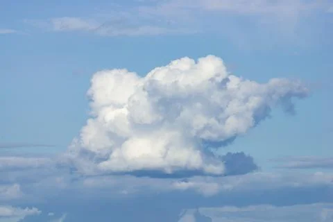 Cumulus clouds on a summer day Stock Photos