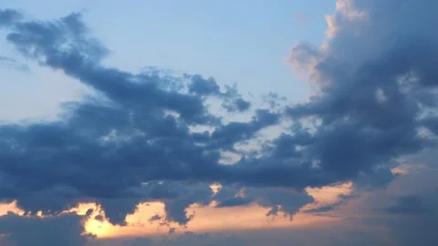 Cumulus clouds at sunset Stock Footage 239846144