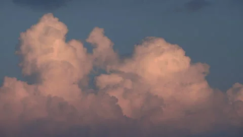 Cumulus Clouds in the Sunset Sky Stock Footage 330758123