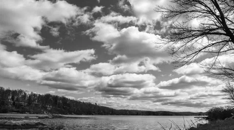 Cumulus Clouds TIme Lapse Over Lake View Video stock 37439401