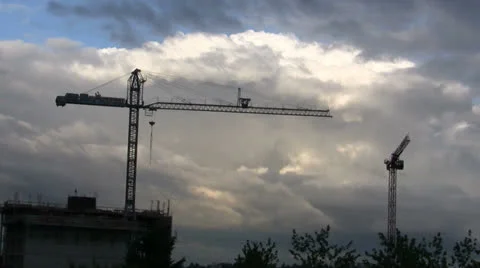CUMULUS CLOUDS TIMELAPSE CONSTRUCTION CRANES Stock Footage 25100368