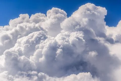 Cumulus cloudscape - view from a window plane Stock Photos