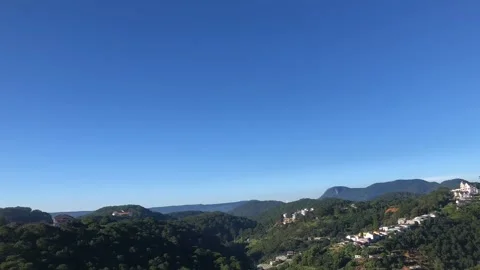 Cumulus rolling clouds timelapse in Dalat, Vietnam's honeymoon capital Stock Footage 154253196