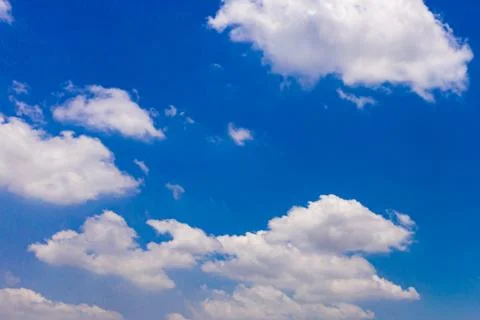 Cumulus white clouds on blue sky for backgrounds concept Stock Photos