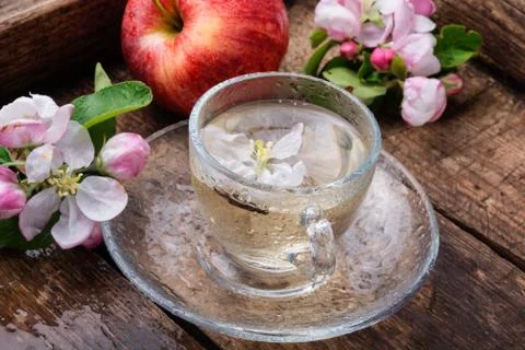 Cup of apple tea Stock Photos