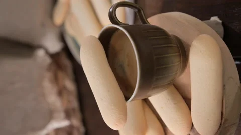 Cup of aromatic black espresso coffee and Cat's tongues These are thin and Stock Footage 204875583