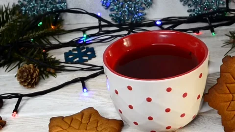 A cup of aromatic tea on christmas holiday Stock Footage 145643942