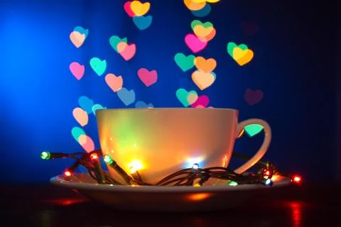 Cup on the background of lights Stock Photos
