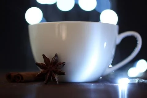 Cup on the background of lights Stock Photos
