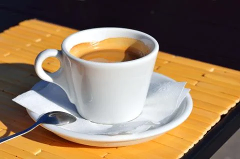 Cup of black aromatic coffee Stock Photos