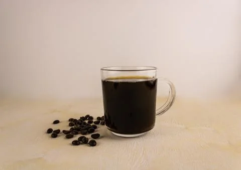 Cup of black coffee with beans Foto stock
