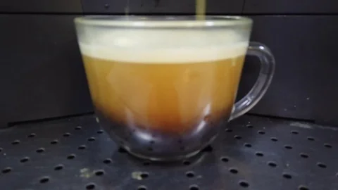 Cup of black coffee on a coffee machine Video stock 123452442