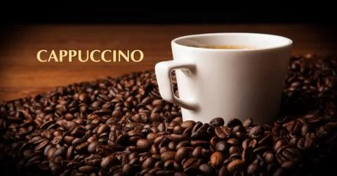 Cup of black coffee with roasted coffe beans Foto stock
