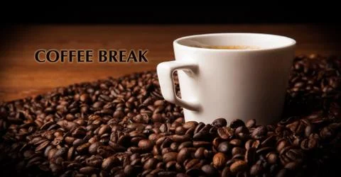 Cup of black coffee with roasted coffe beans with title coffee break Stock Photos