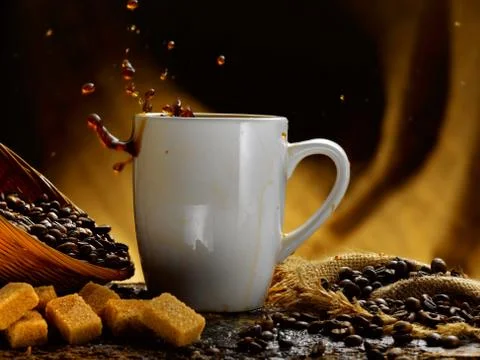 Cup of black coffee in rustic setting Stock Photos