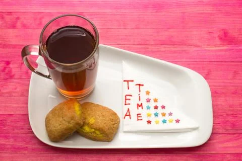 Cup black tea and  cookies with lemon cream Stock Photos