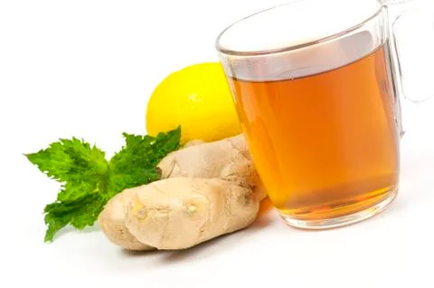 Cup of black tea with ginger, lemon and mint Stock Photos
