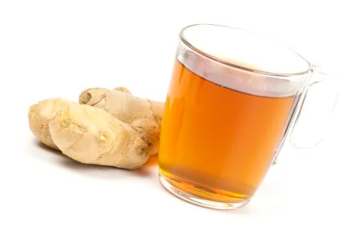 Cup of black tea with ginger Stock Photos