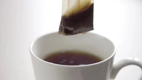 Cup of black tea isolated on white Stock Footage 160954433