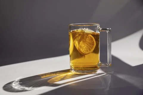 A cup of black tea, isolated on a white background with shadows with splashes Stock-Fotos