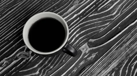 A cup with black tea on the table Stock Footage 63176821