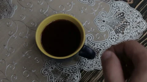 A cup with black tea on the table Stock Footage 63179118