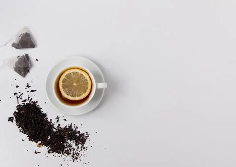 Cup of black tea top view on a white background. Stock Photos