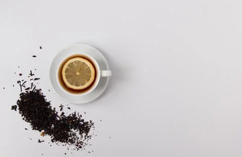 Cup of black tea top view on a white background. Stock Photos