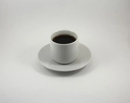 Cup of black tea on white background Stock Photos