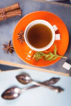 Cup on the book Stock Photos