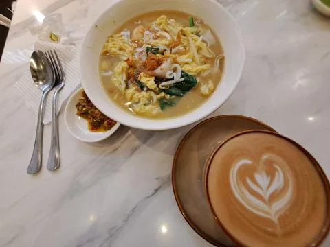 A Cup of Caffe Latte with Heart Latte Art Served with Scrambled Egg Instant Nood Stock Photos