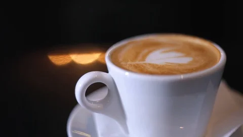 Cup Of Cappuccino On a Black Surface Stock Footage 103488740
