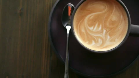 A cup of cappuccino is on the table. Stock Footage 311261840