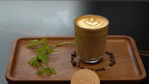 Cup of cappucino on a plate Stock Footage 314908868