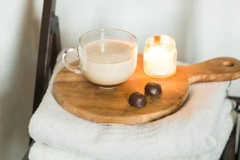 Cup of carob and candy Stock Photos