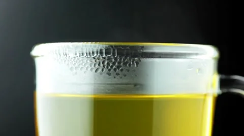 A cup of chamomile tea (detail) Stock Footage 8573004