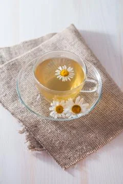 Cup of chamomile tea Stock Photos