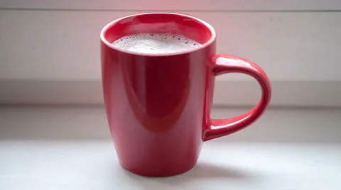 A cup of cocoa on the window Stock Footage 44475579