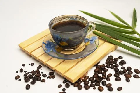 A cup coffe and coffe bean Stock Photos